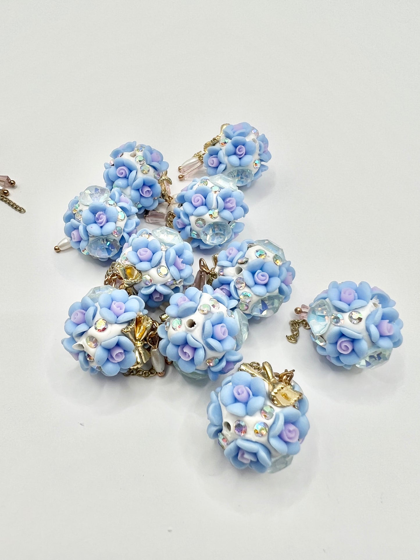 Light Blue Flower with Bow Bead