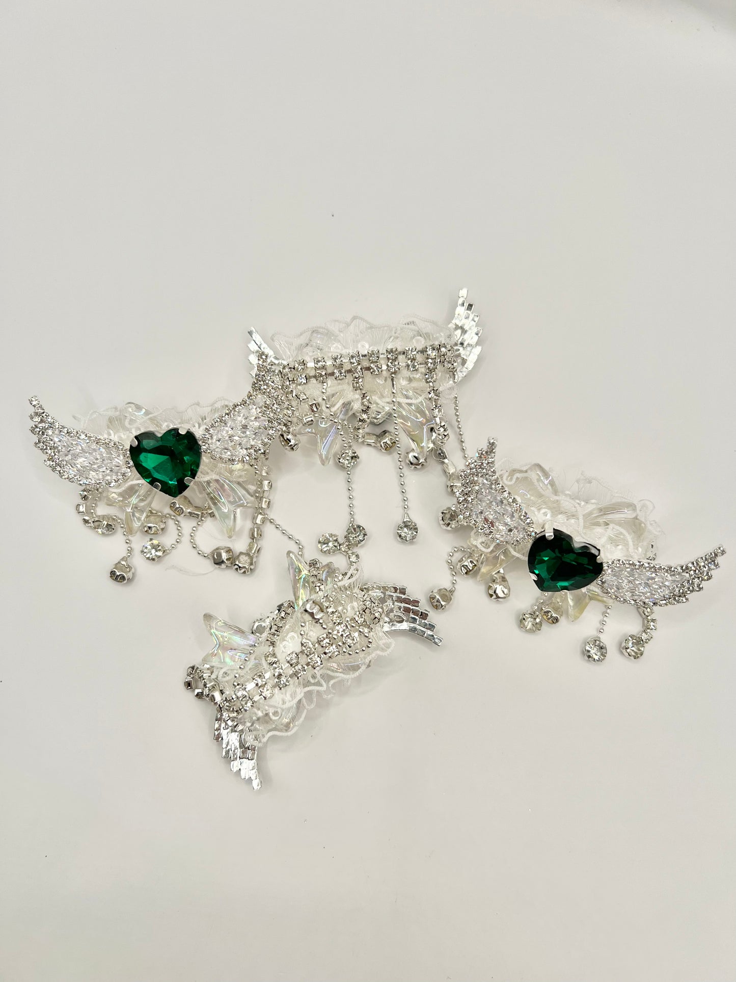 Luminous Clear Bow with Angel Wings and Green Heart